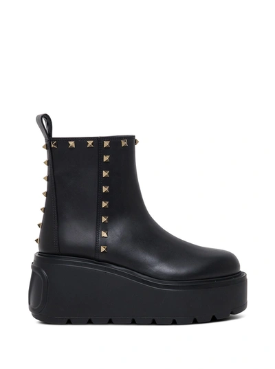 Shop Valentino Uniqueform Studded Leather Boots With Oversize Sole In Black