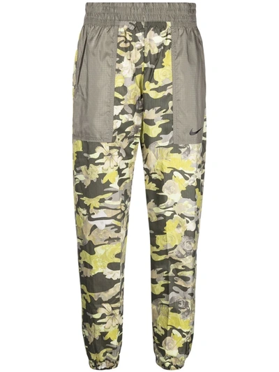Shop Nike Floral-print Track Trousers In Grün