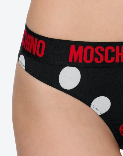 Shop Moschino All-over Polka Dots Stretch Thong In Black