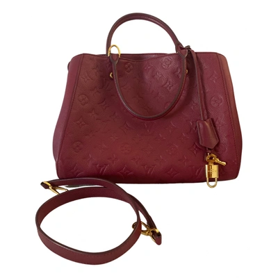 Pre-owned Louis Vuitton Montaigne Leather Handbag In Burgundy