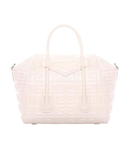 Shop Givenchy Ivory Antigona Lock Mini 4g Leather Bag