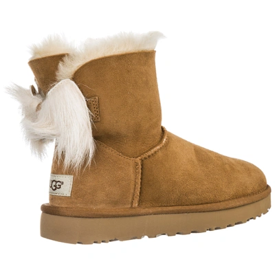 Ugg Women's Suede Ankle Boots Booties Fluff Bow Mini In Brown | ModeSens