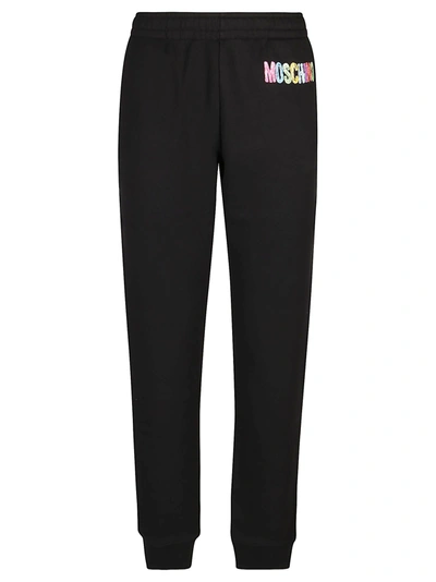 Shop Moschino Logo Printed Track Pants In Black