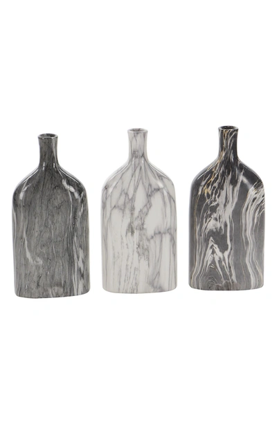 Shop Uma Ceramic White Marble Bottle Vase