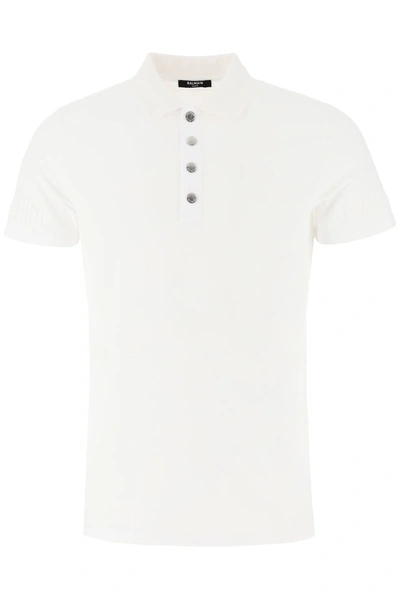 Shop Balmain Polo Shirt With Embossed Logo In Blanc (white)