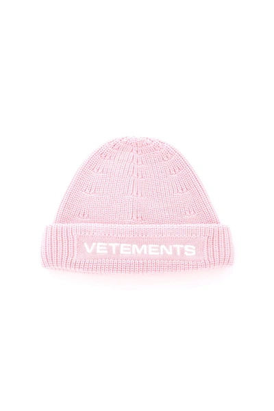 Shop Vetements Logo Beanie Hat In Baby Pink White (pink)