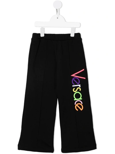 Shop Versace Logo-embroidered Wide-leg Sweatpants In Black