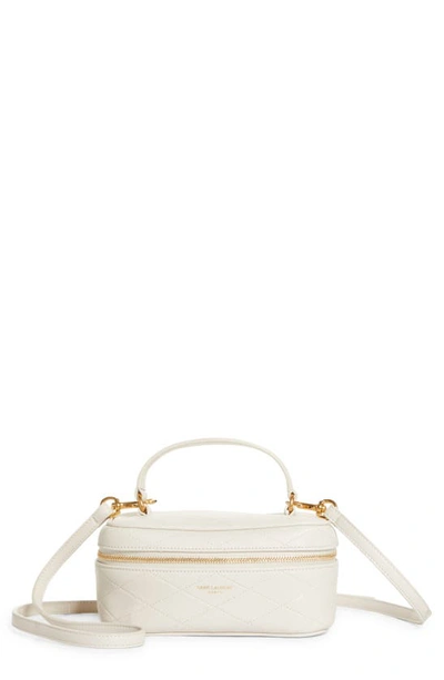 Shop Saint Laurent East/west Vanity Case Quilted Leather Top Handle Bag In Crema Soft