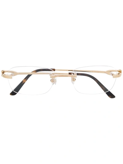 Shop Cartier Frameless Rounded Glasses In 金色
