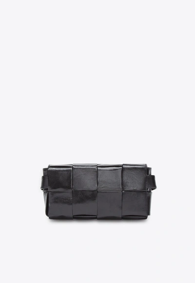 Shop Bottega Veneta Mini Cassette Belt Bag In Intrecciato Calfskin In Black
