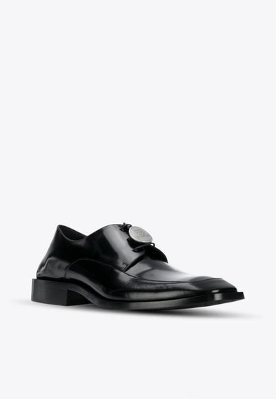 Shop Balenciaga Leather Oxford Shoes With Logo Plaque In Black