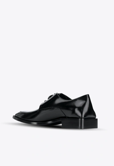 Shop Balenciaga Leather Oxford Shoes With Logo Plaque In Black