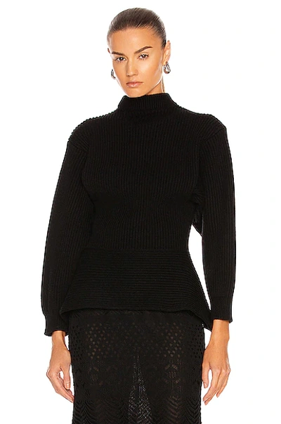 Shop Alaïa Fitted Sculpted Long Sleeve Sweater In Noir