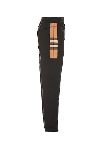 Shop Burberry Side Check Panel Joggers In Black