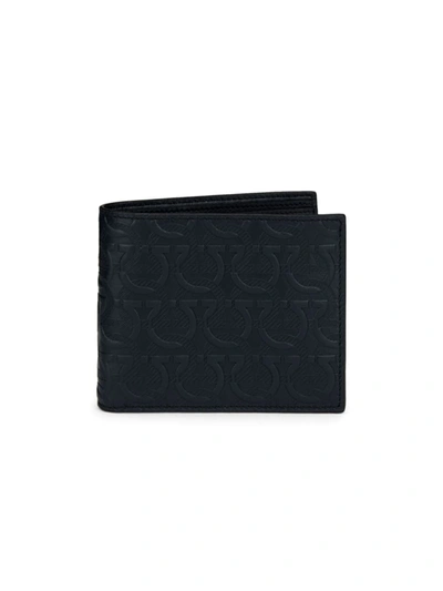 Shop Ferragamo Embossed Logo Leather Billfold Wallet In Dark Navy