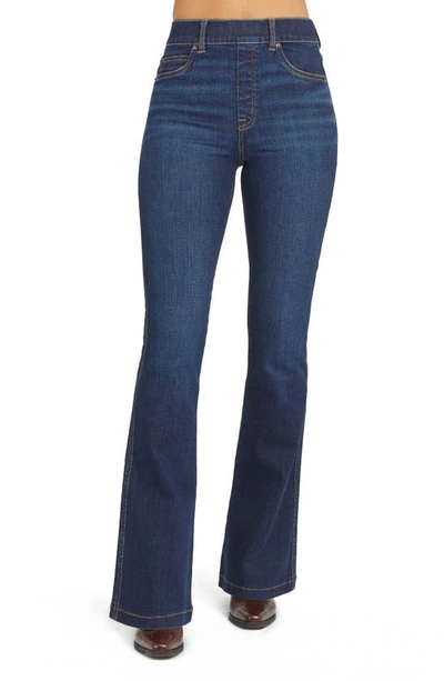 Shop Spanxr Flare Jeans In Midnight Shade
