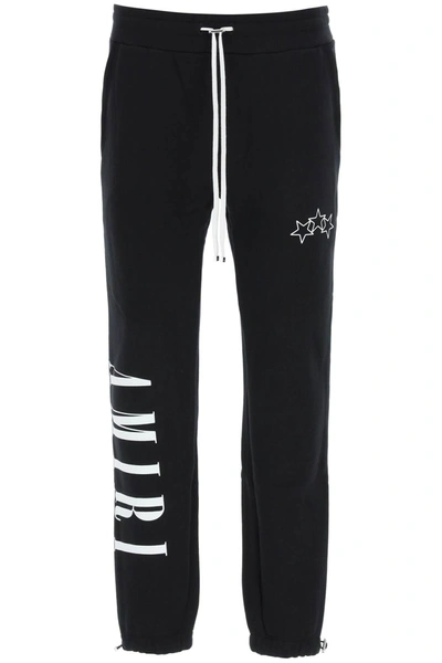 Shop Amiri Vertical Logo Crack Ink Sweatpants In Black (black)