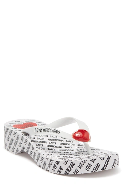 Shop Love Moschino Platform Flip-flop Sandal In Pvc Bianco