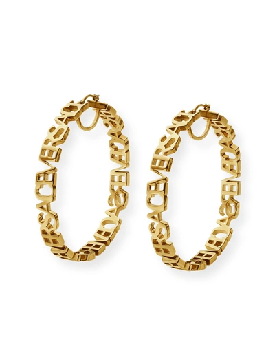 Shop Versace Logo Text Hoop Earrings In  Gold