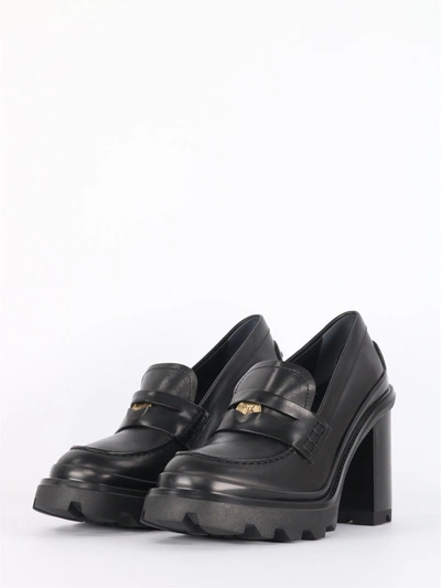Shop Tod's Penny Loafers In Leather With Black Heel