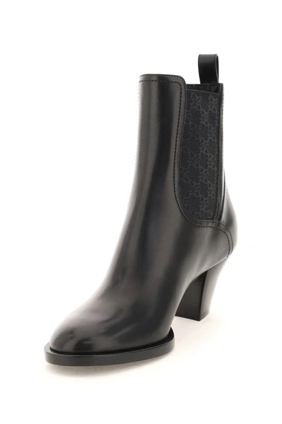 Shop Fendi Karligraphy Leather Ankle Boots In Black
