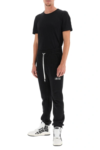 Shop Amiri Core Logo Sweatpants In Black,white