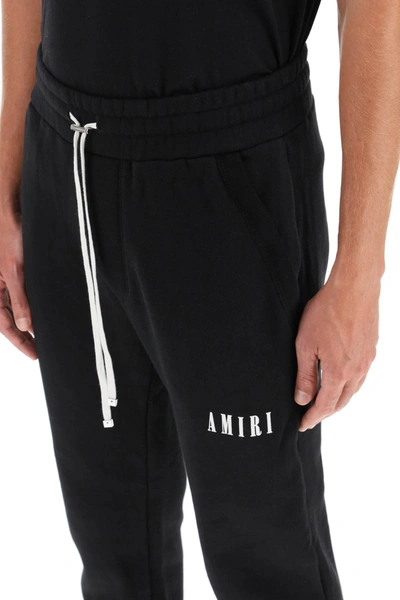 Shop Amiri Core Logo Sweatpants In Black,white