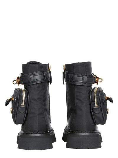 Shop Moschino Safari Boots In Black