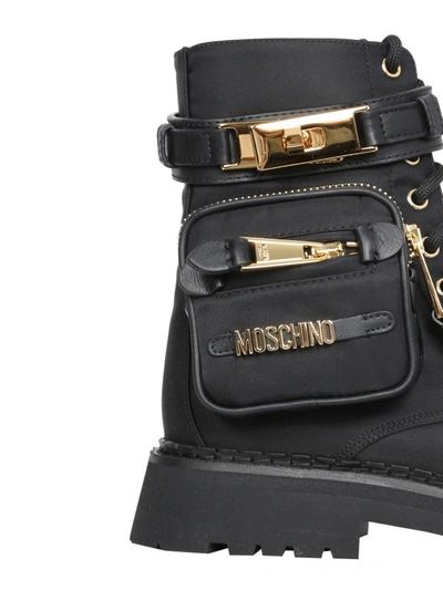 Shop Moschino Safari Boots In Black