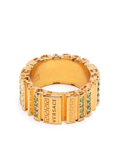 Shop Versace Crystal Embellished Greca Ring In Gold