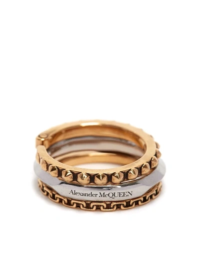 Shop Alexander Mcqueen Three Linked Rings In Gold