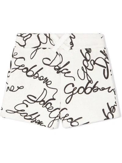 Shop Dolce & Gabbana All-over Logo Print Shorts In White