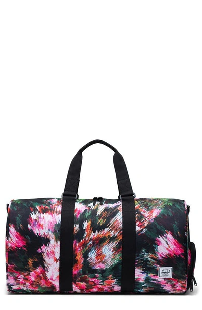 Shop Herschel Supply Co Novel Duffle Bag In Pixel Floral