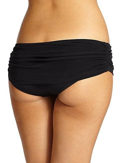 Shop Norma Kamali Bill Ruched Super Low-rise Bikini Bottom In Black