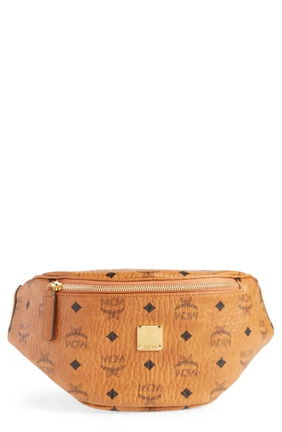 Shop Mcm Small Stark Coated Canvas Belt Bag In Cognac