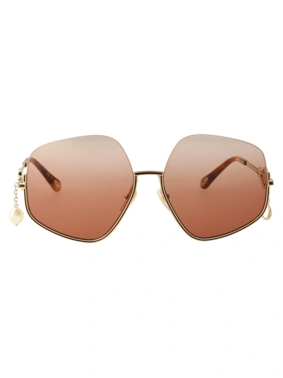 Shop Chloé Eyewear Pentagonal Frame Sunglasses In Gold