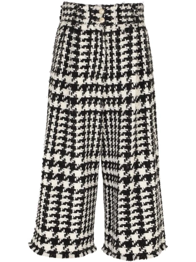 Shop Dolce & Gabbana Houndstooth Cropped Trousers In Black