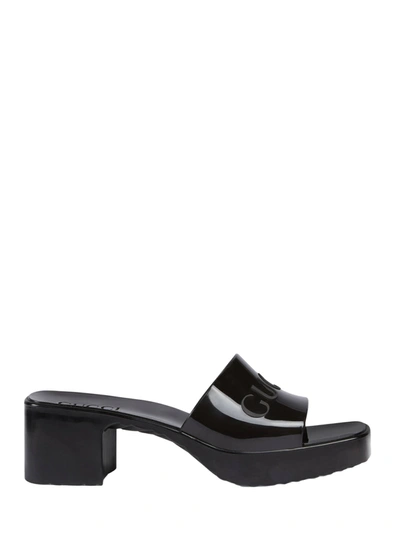 Shop Gucci Rubber Slider Sandal In Black