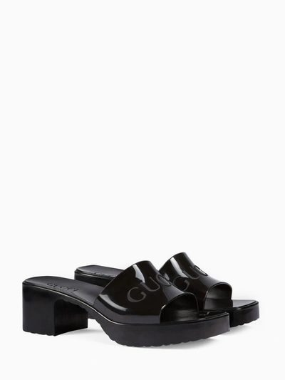 Shop Gucci Rubber Slider Sandal In Black