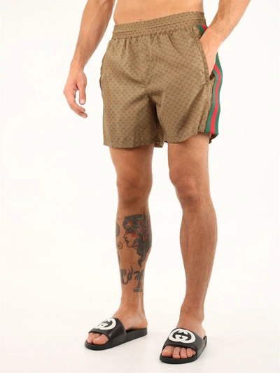 Shop Gucci Nylon Swim Shorts With Gg In Brown