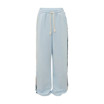 Shop Jw Anderson Wide Leg Contrast Stitch Track Pant In Baby Blue