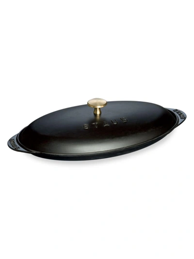 Shop Staub Cast Iron Covered Fish Pan In Black