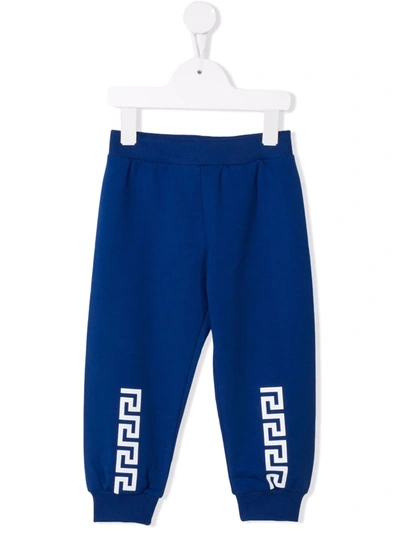 Shop Versace Greca-print Cotton Track Pants In Blue