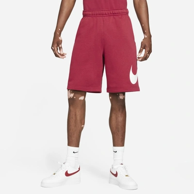 Shop Nike Sportswear Club Men's Graphic Shorts In Pomegranate,pomegranate