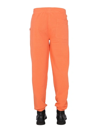 Helmut Lang Logo-print Tapered Joggers In Orange