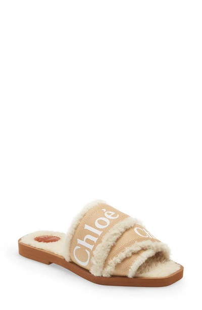 Shop Chloé Woody Genuine Shearling Slide Sandal In Soft Tan