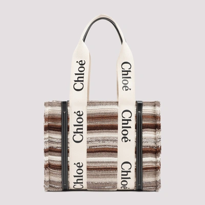 Shop Chloé Woody Bag In Nude &amp; Neutrals