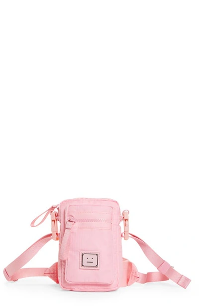 Shop Acne Studios Arvel Face Plaque Crossbody Bag In Bright Pink