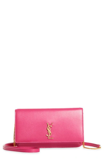 Shop Saint Laurent Monogram Phone Shoulder Bag In Fuxia Couture