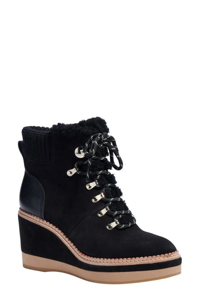 Shop Kate Spade Willow Genuine Shearling Wedge Bootie In Black